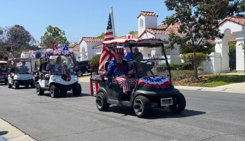 Ocean Hills Country Club - 4th of July Golf Cart Parade - Cart with multiple flags